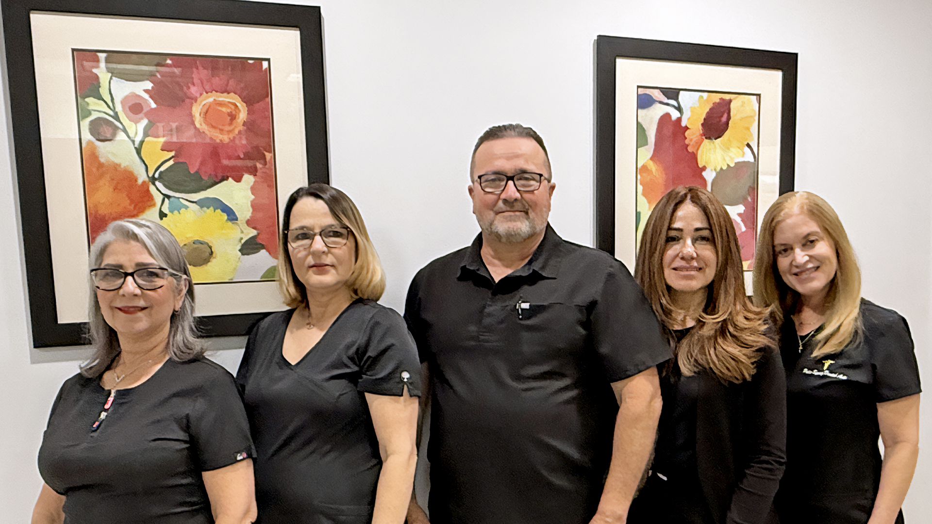 The Palm Springs Dental Arts team with Dr. Alex Perez in their Hialeah office